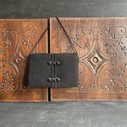 Pair of antique decorative panels in carved wood, late 19th century.