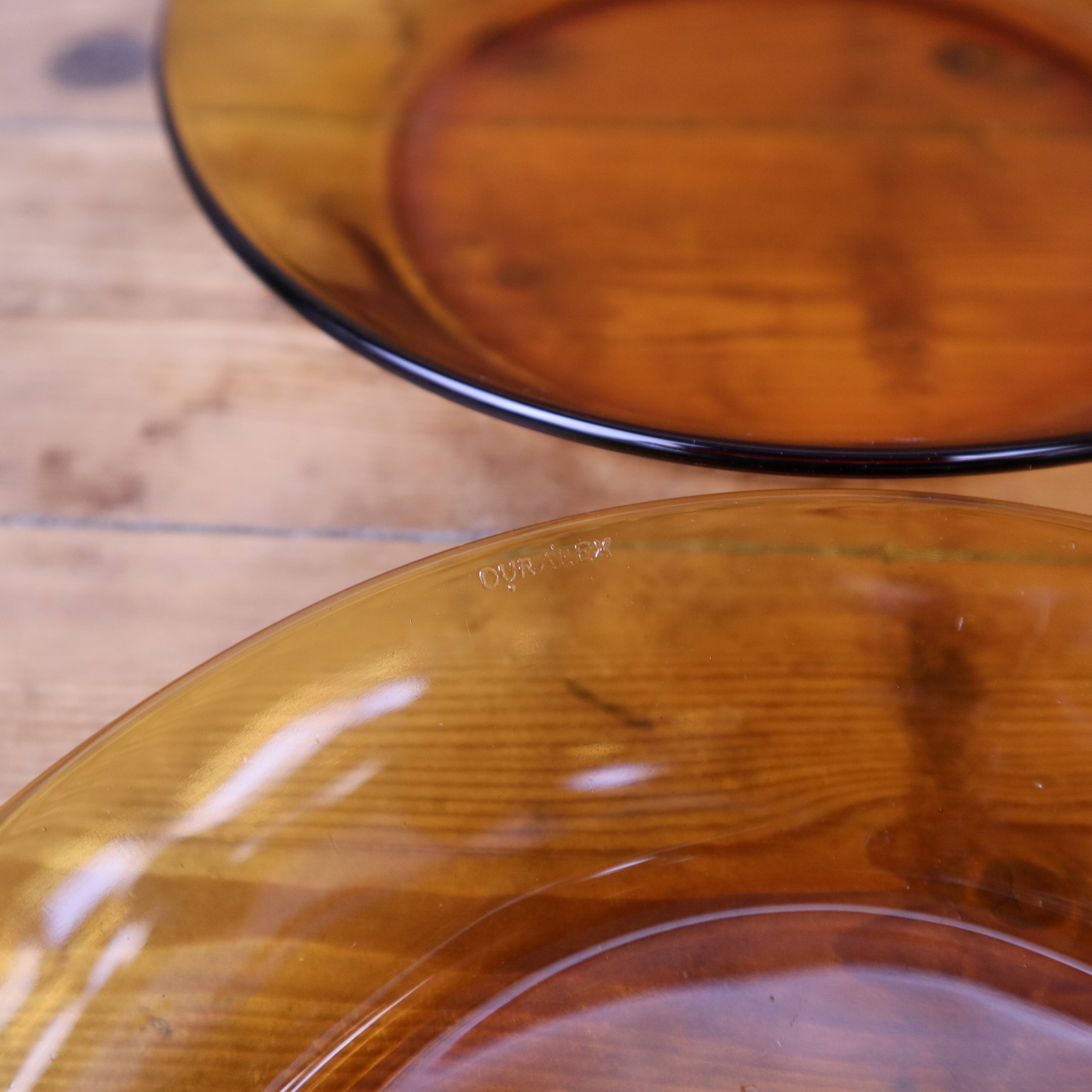 Set of 7 amber Duralex deep plates.