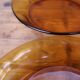 Set of 7 amber Duralex deep plates.
