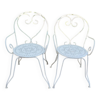 2 wrought iron armchairs