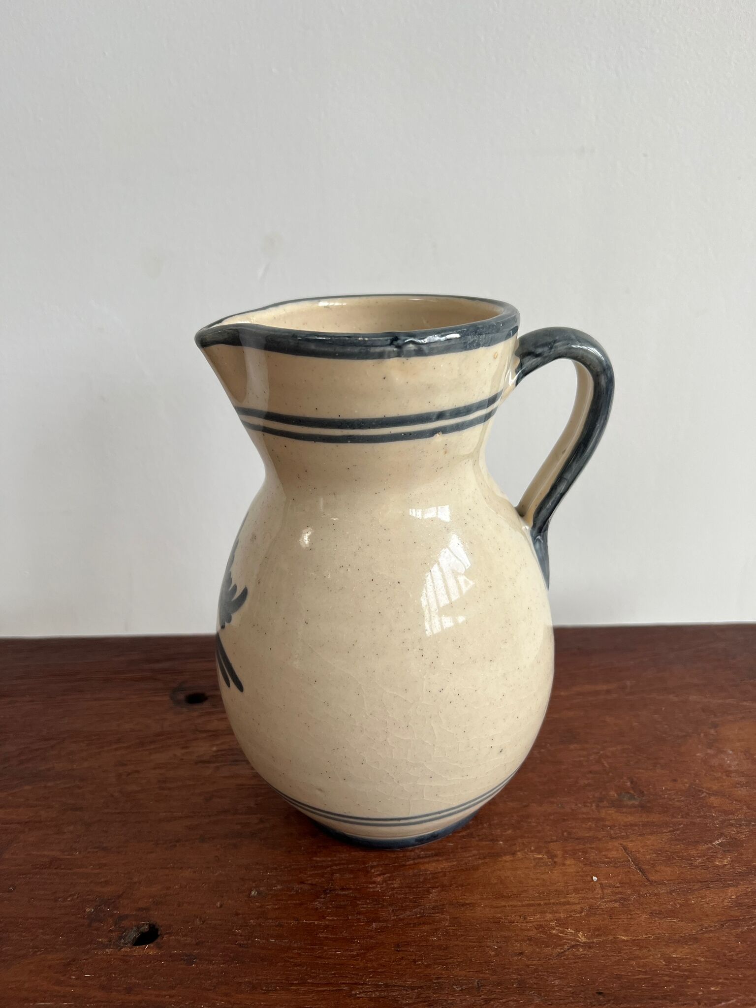 Off-white glossy ceramic decanter, hand-painted gray blue patterns H:20cm