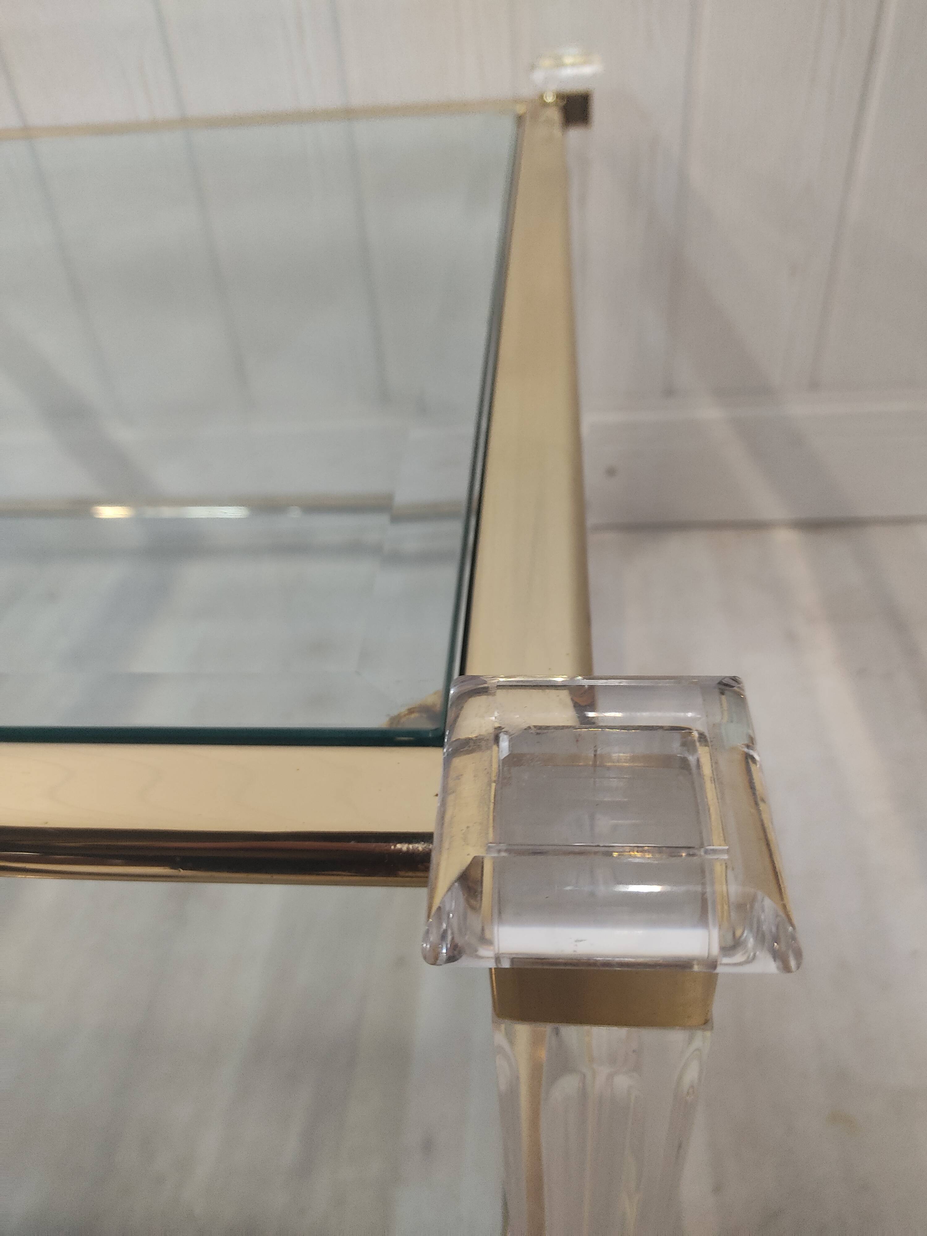 Brass coffee table, beveled glass and altuglas