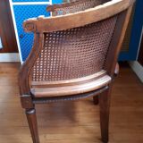 Pair of caned gondola armchairs