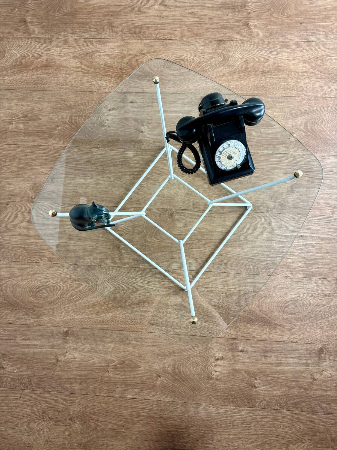 Glass coffee table with steel base