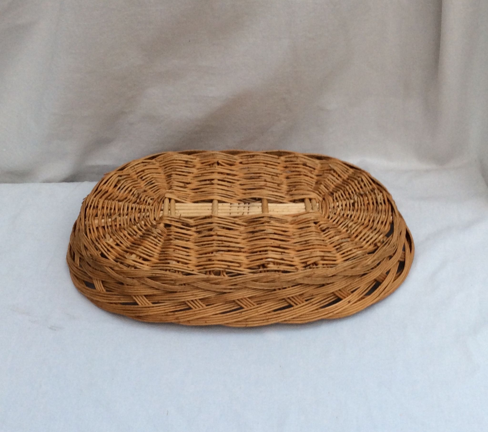 Vintage oval-shaped wicker basket