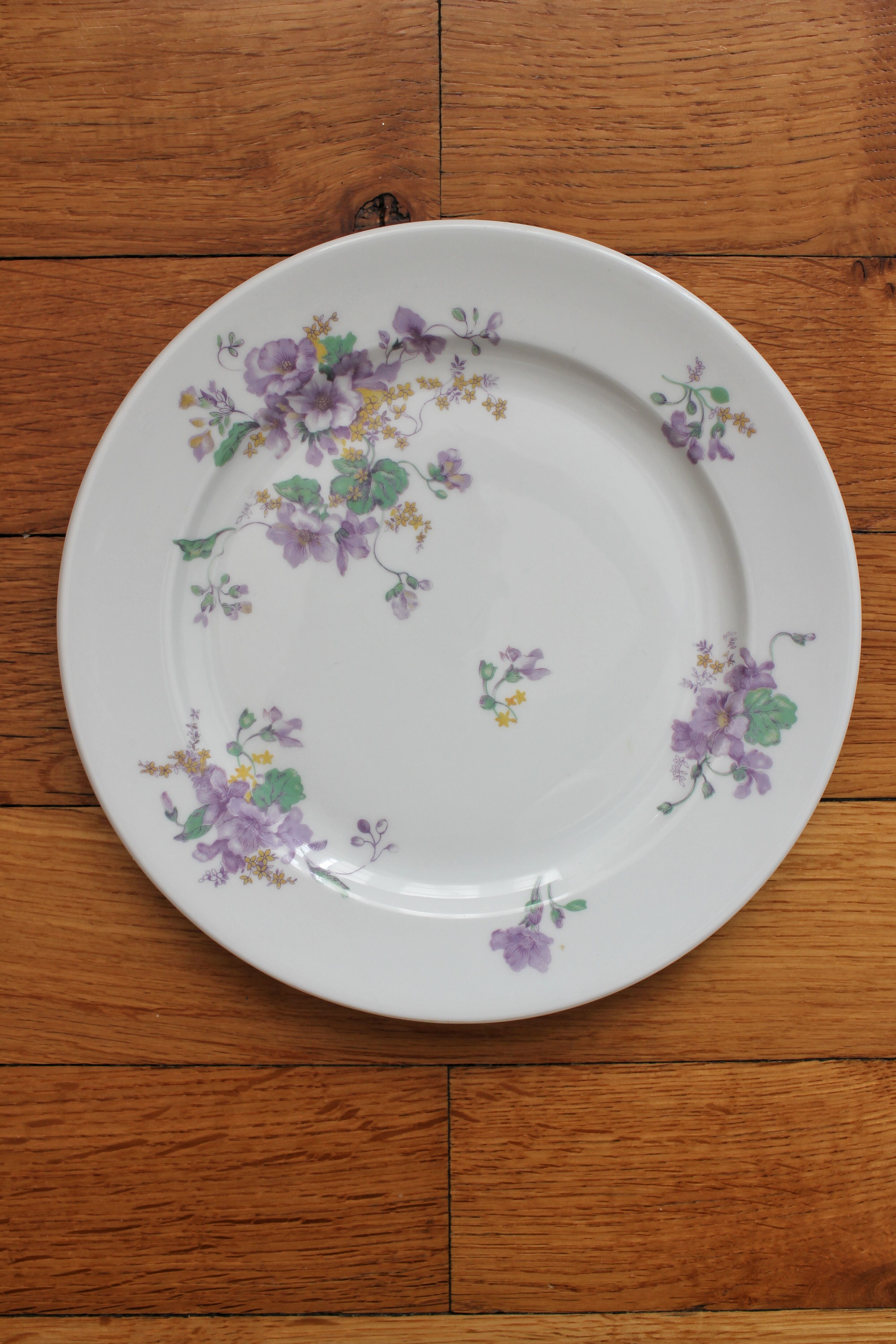 4 porcelain dessert plates decorated with flowers Bernardaud Limoges