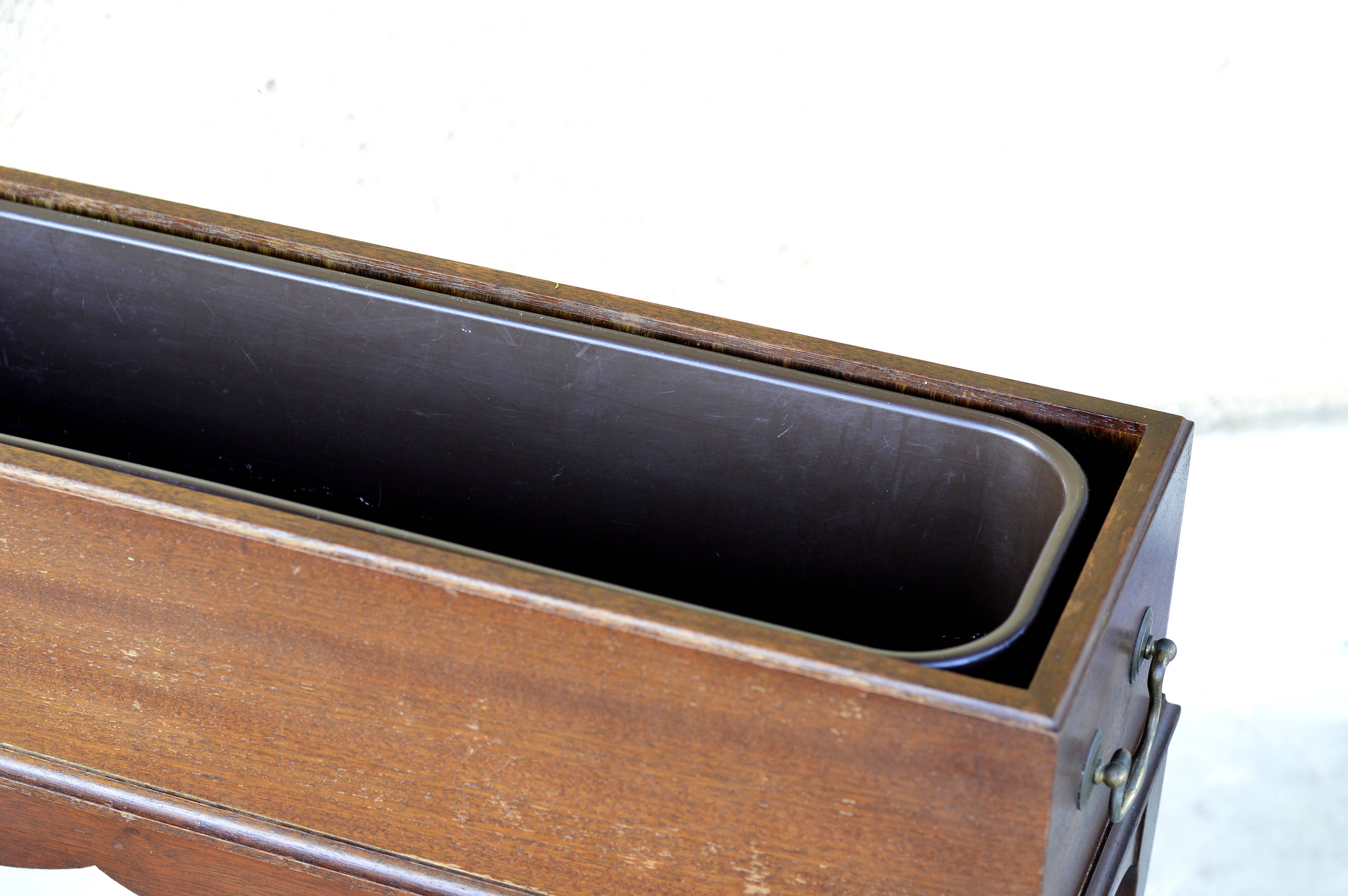 Elegant mid-century teak planter with tray.