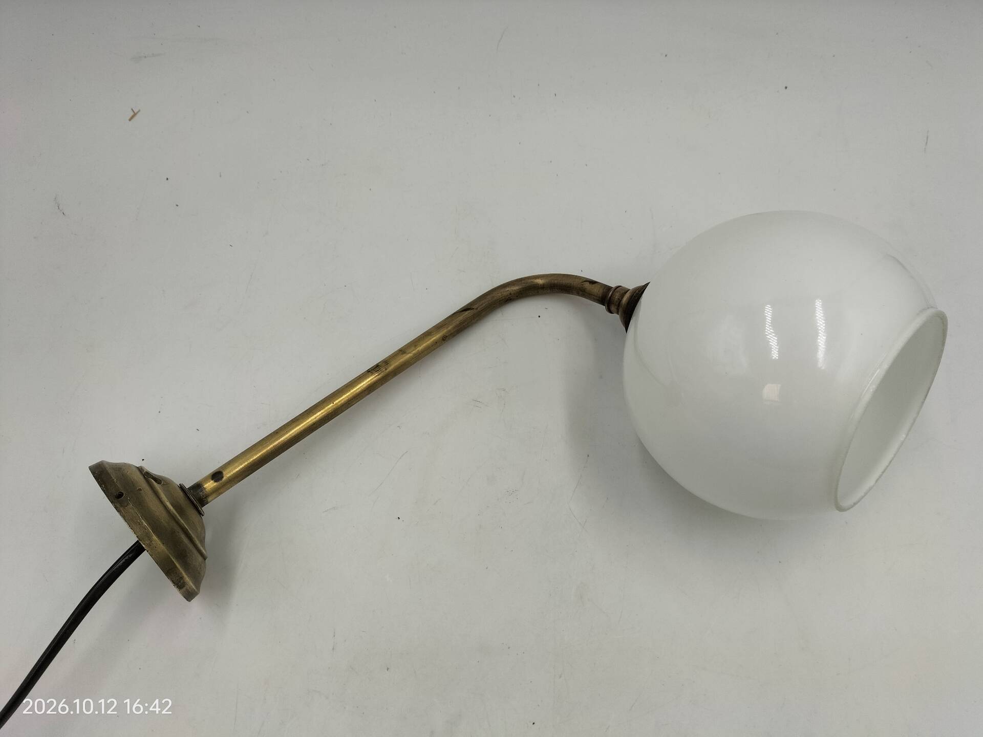 Brass and glass wall light