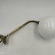 Brass and glass wall light