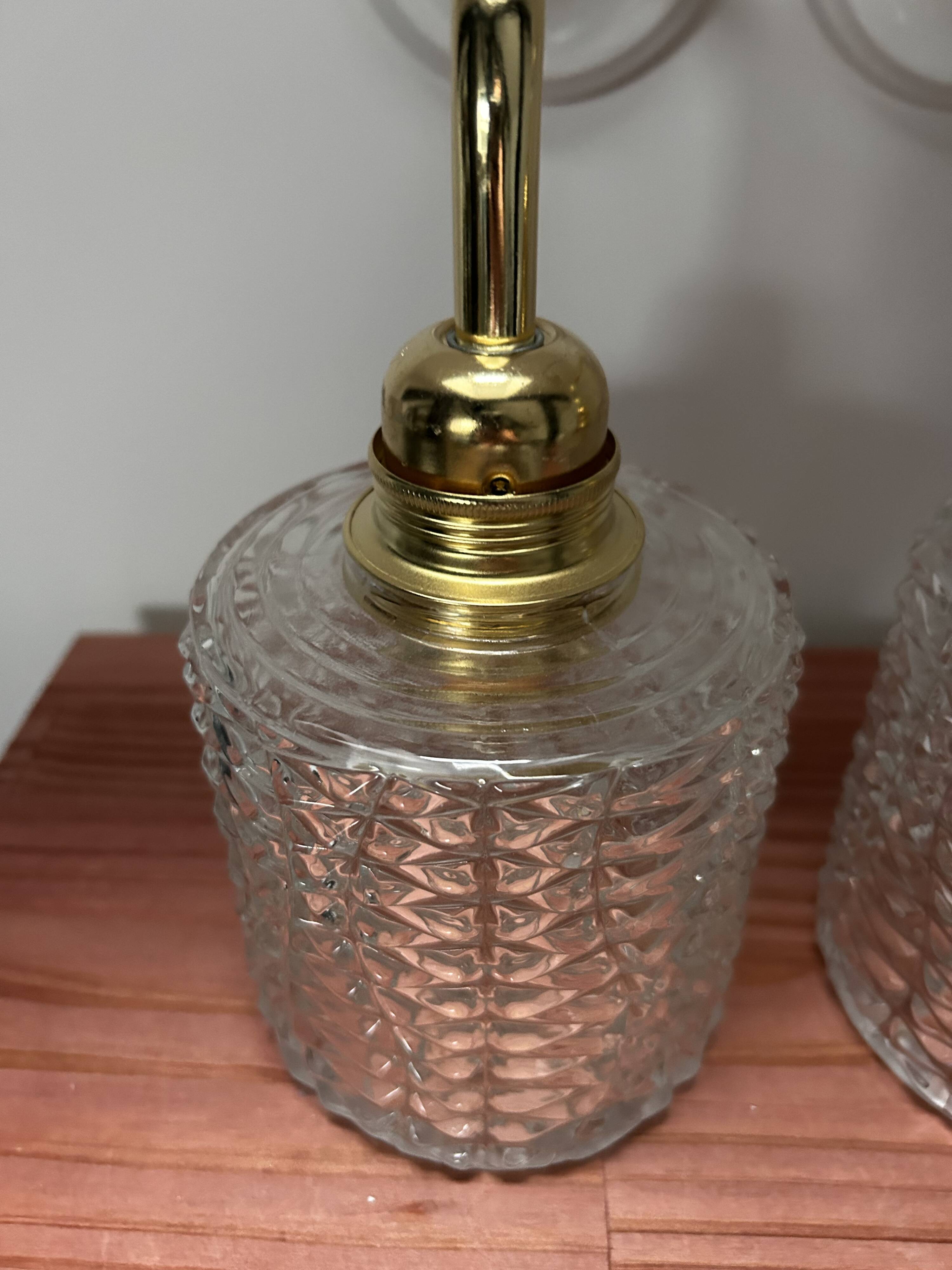 Pair of seventies glass globe wall lights