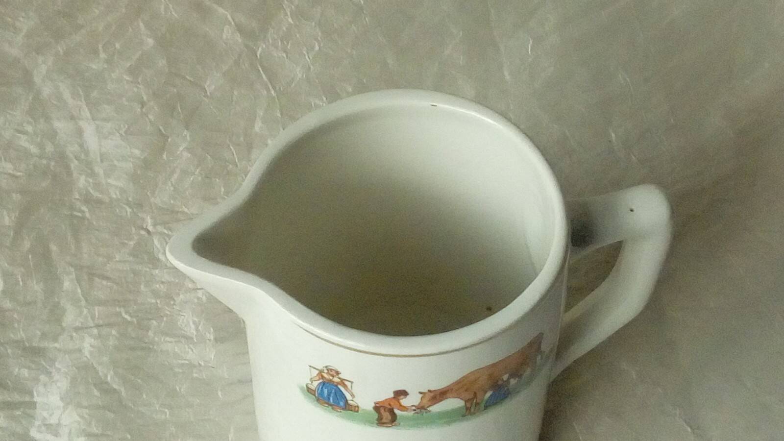 Milk jug/pitcher in earthenware, the milkmaid