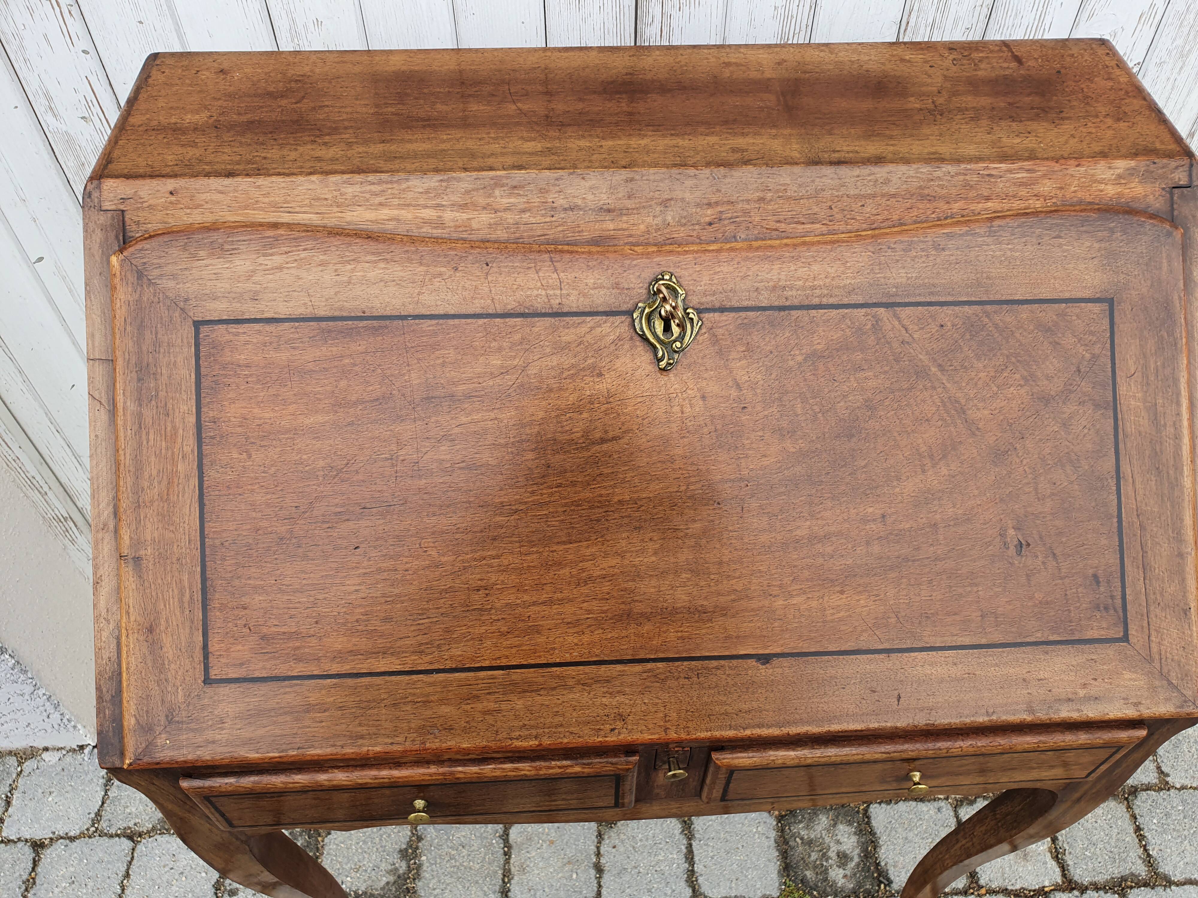 Former small secretary office with a walnut Louis XV