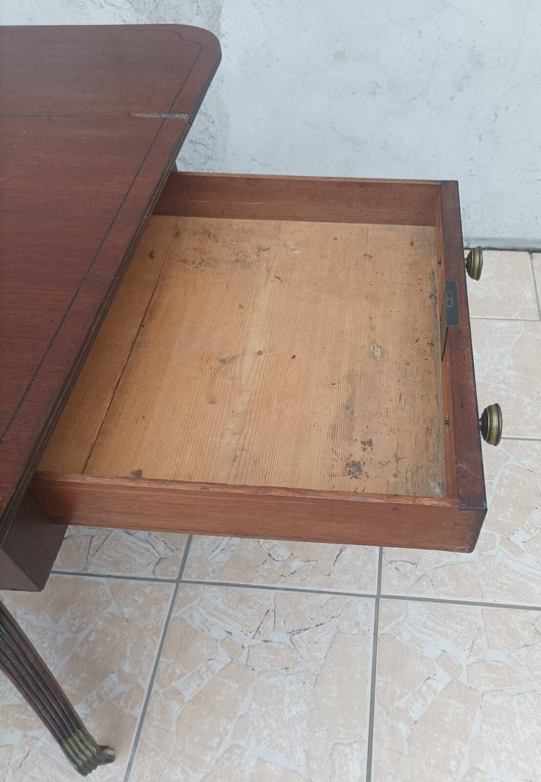 19th-century English style mahogany drop-leaf table.