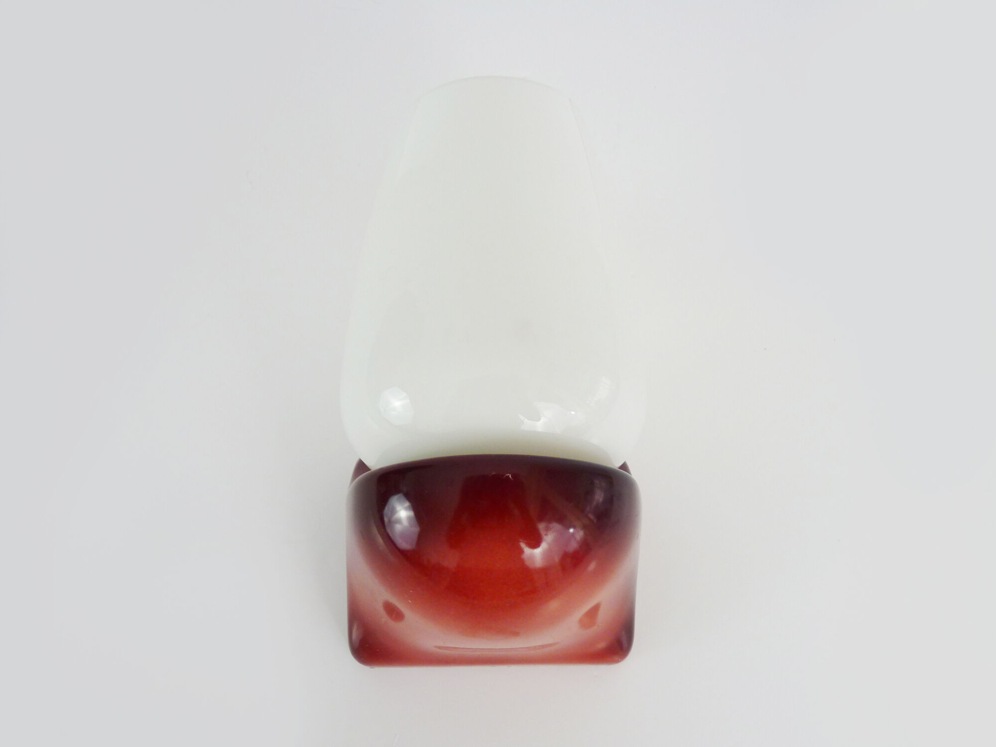 Vintage wall lamp in burgundy pvc and globe in white opaline. Year 70
