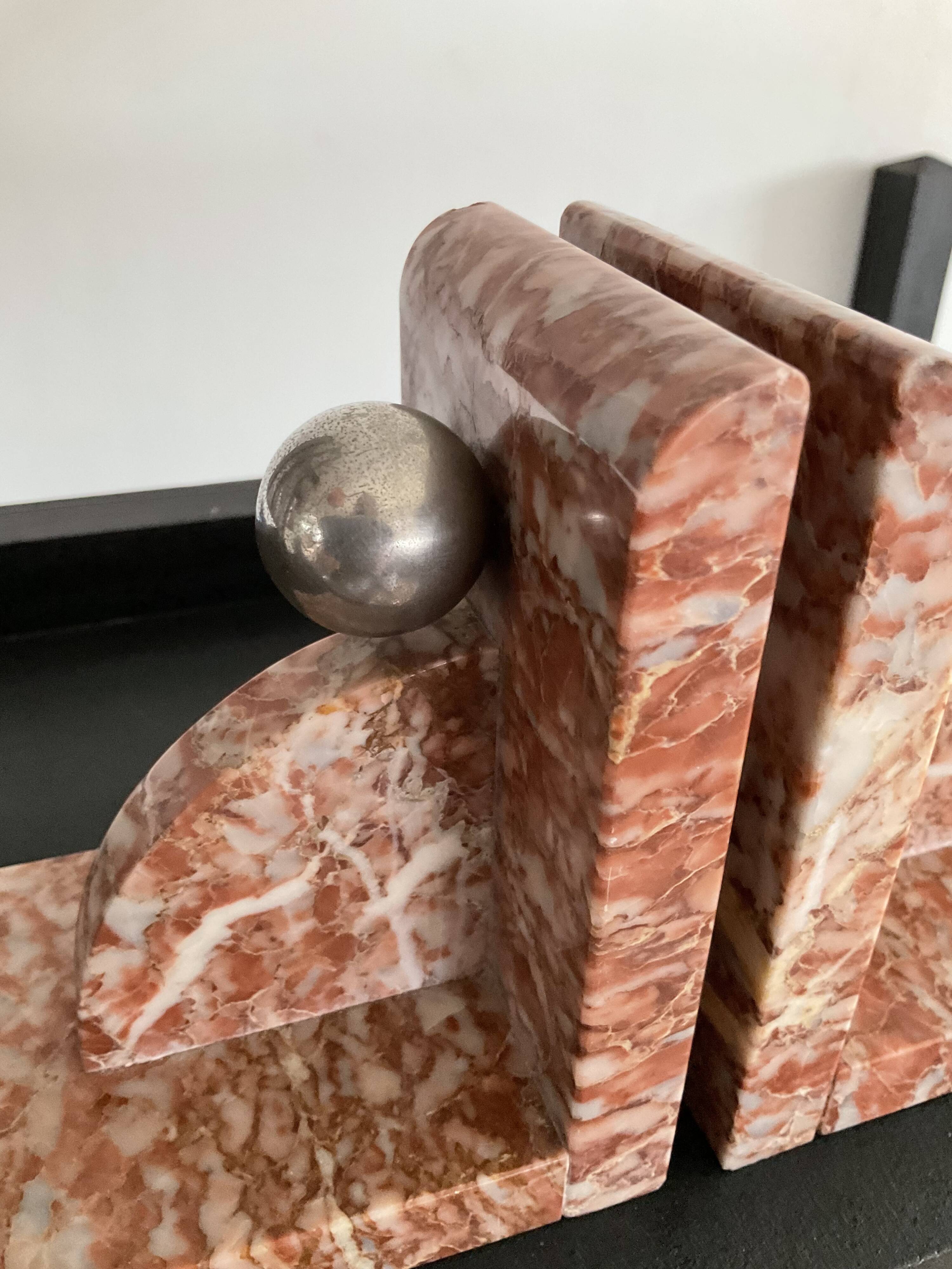 Pair of art deco series-books in marble and brass