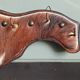 Wooden coat rack, nails & cowhide