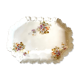 Old tray in floral pattern biscuit