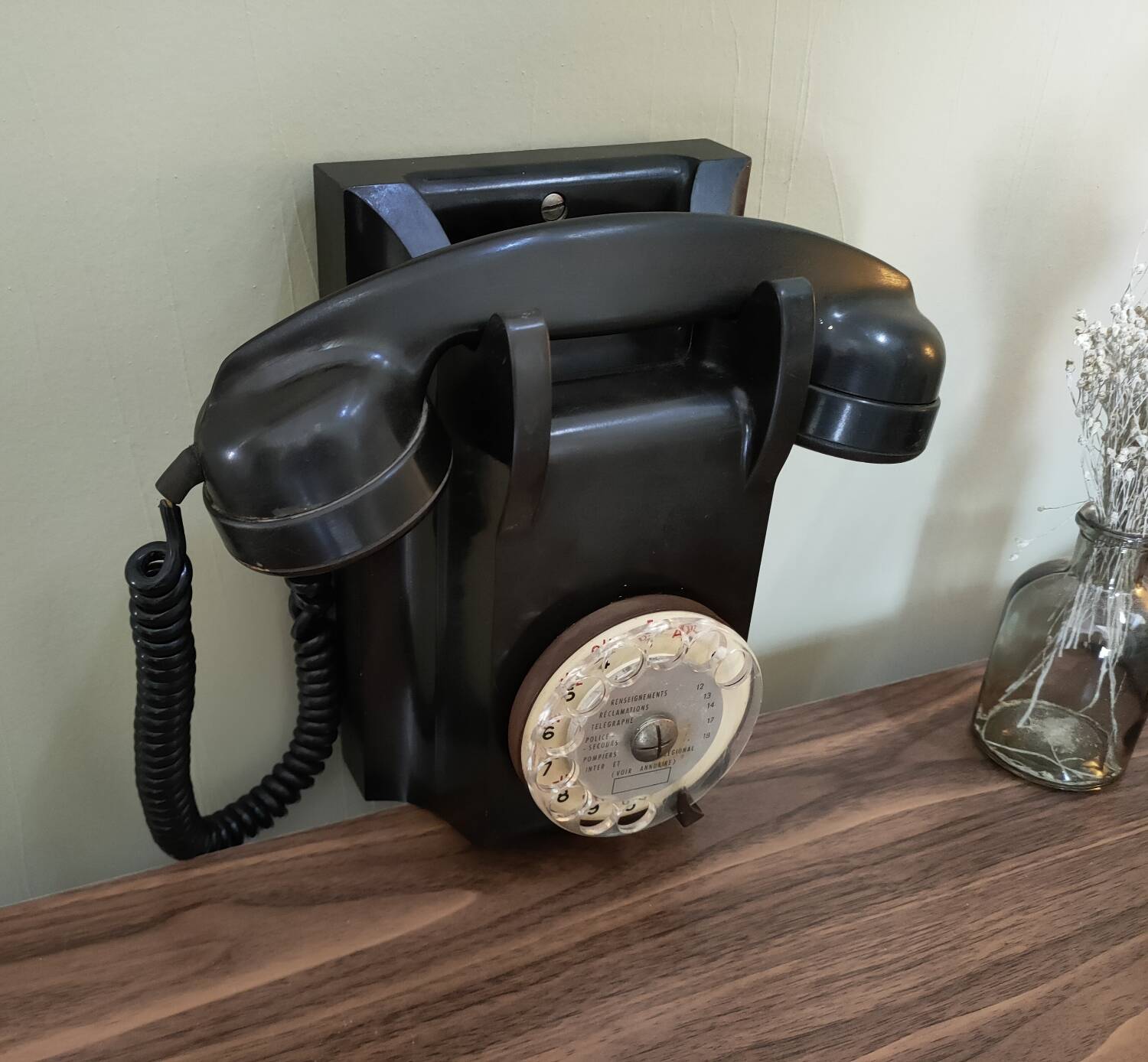 Old bakelite wall telephone