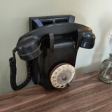 Old bakelite wall telephone