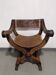 Siège Curule Rare en Bois Sculpté et Cuir Repoussé – Signé P.C. SCAFA Naple