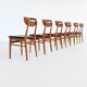 Set of six Danish dining chairs in teak and faux leather Denmark 1960
