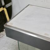 Modernist console, 1960s, glass base, wooden and fabric top.