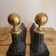 Pair of cast iron and brass chenets