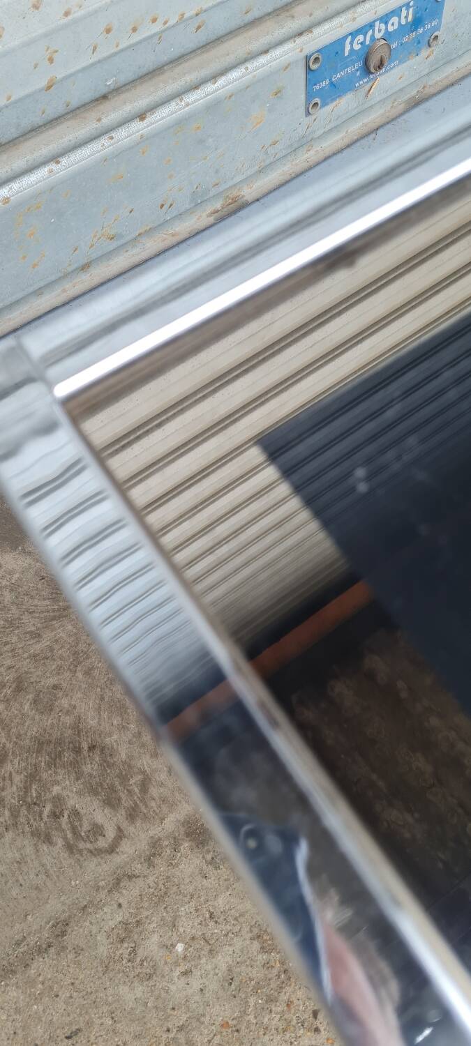 Pair of side tables in chrome metal and glass