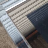 Pair of side tables in chrome metal and glass