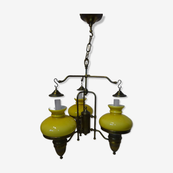 Brass chandelier and mustard yellow opaline glass