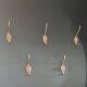 Set of 5 antique "Lion Head" coat hooks.