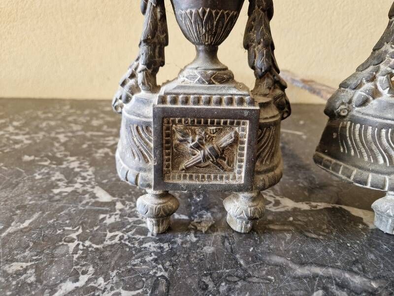 Pair of bronze andirons in Louis XVI style, late 19th century.