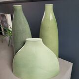 Trio of green enamelled vases