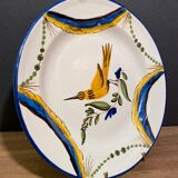 Large earthenware dish signed with bird decoration