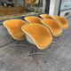 6 fauteuils Eames Lafonda tissu orange pied chromé vers 1970s