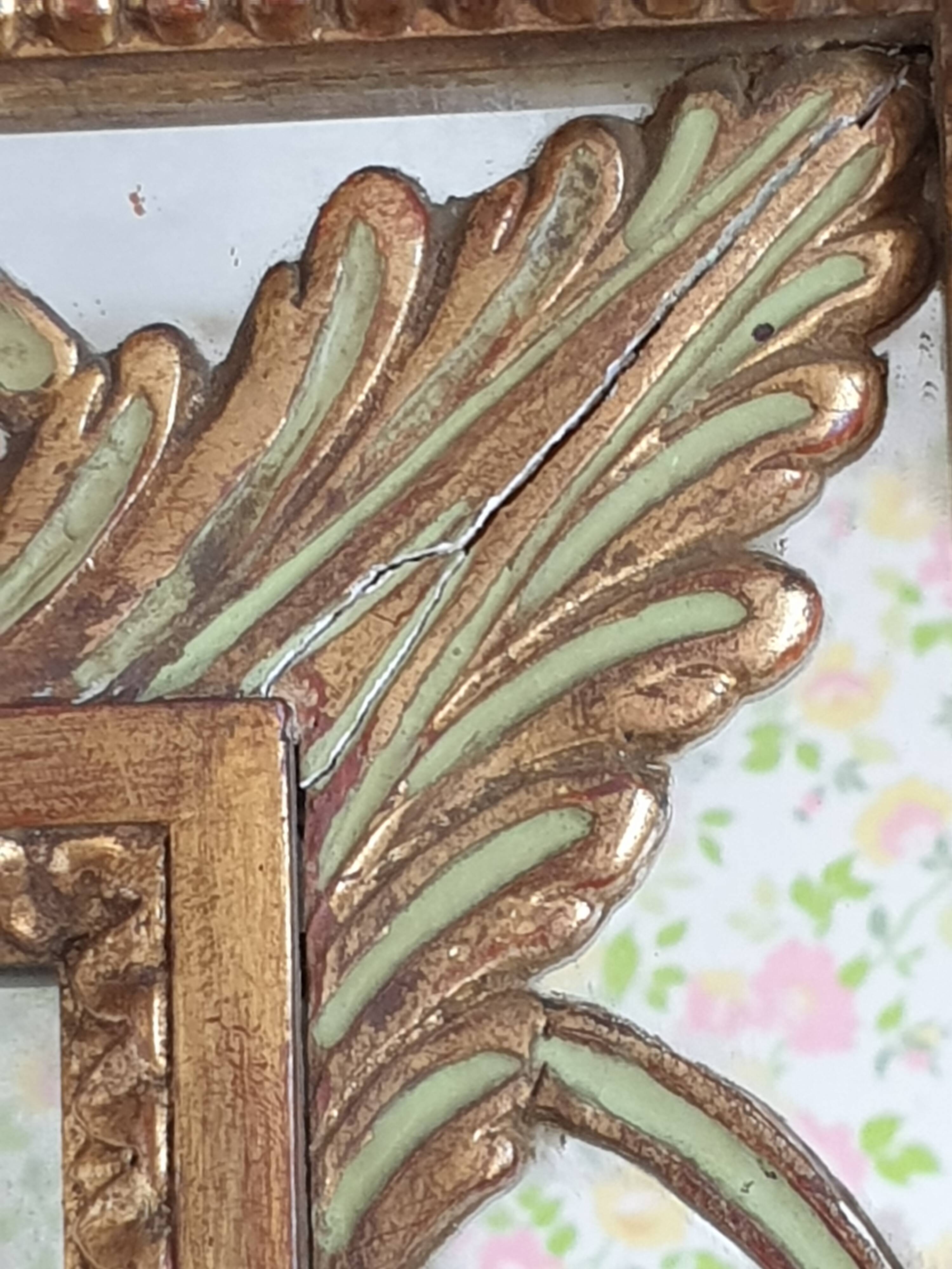Classic antique mirror in gilded wood