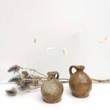 Set of two small sandstone pitchers