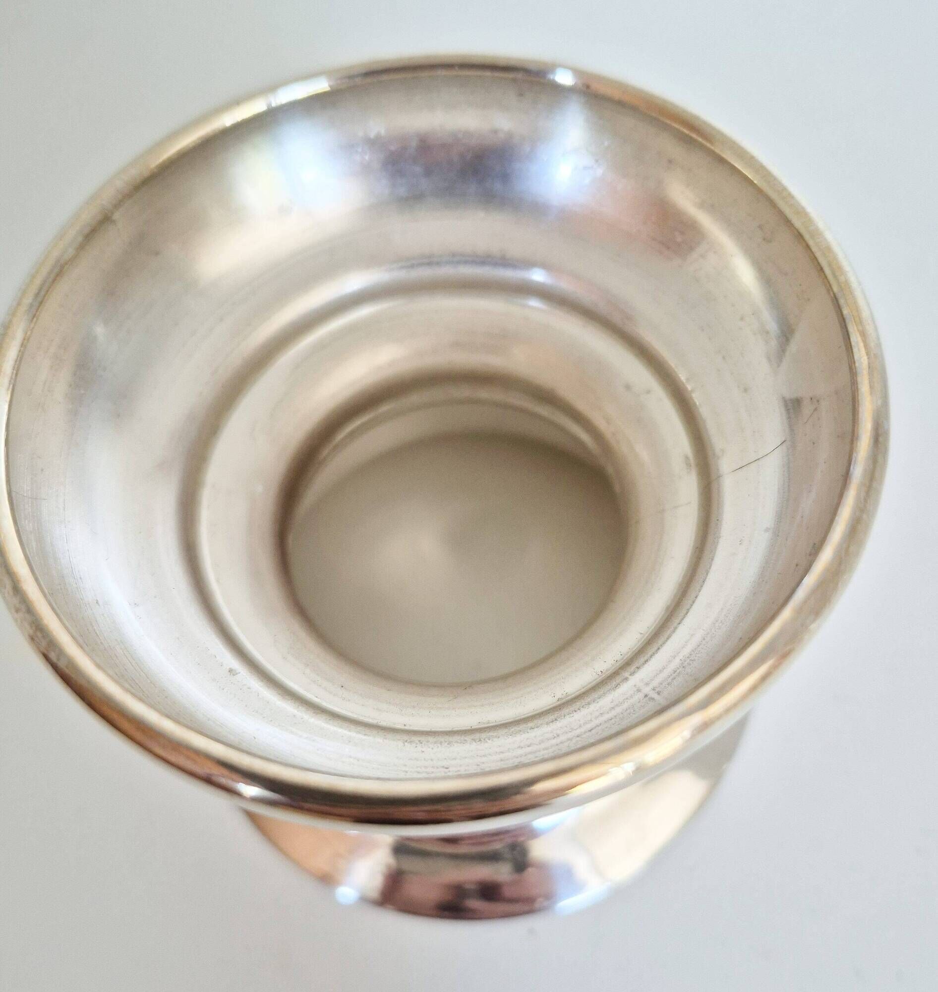 Antique silver candle holder.