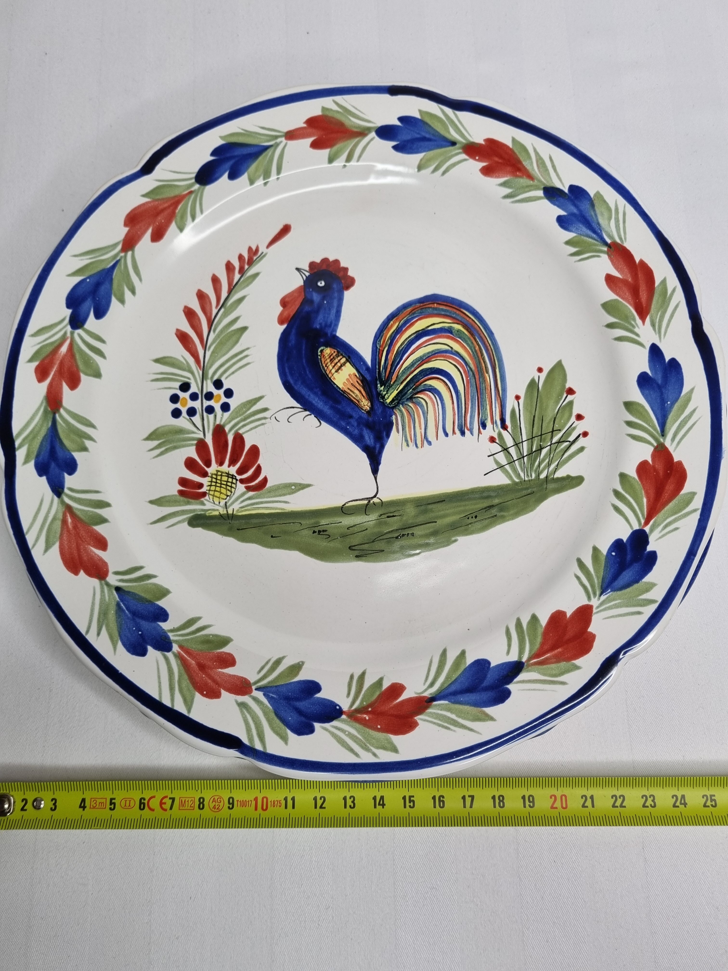 Pair of Henriot Quimper flat plates decorated with rooster and flowers