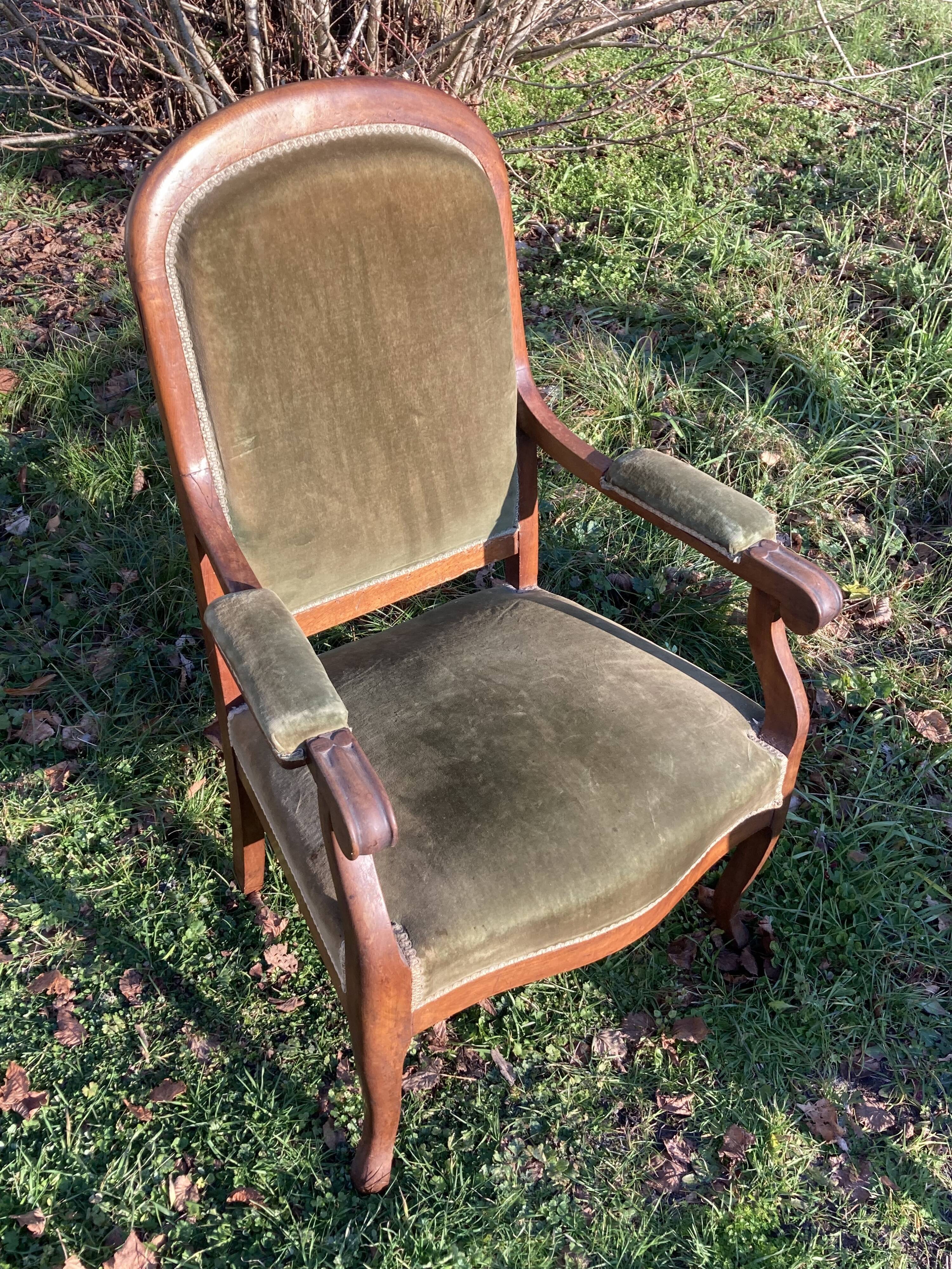 Antique Voltaire armchair in wood and green velvet Louis Philippe