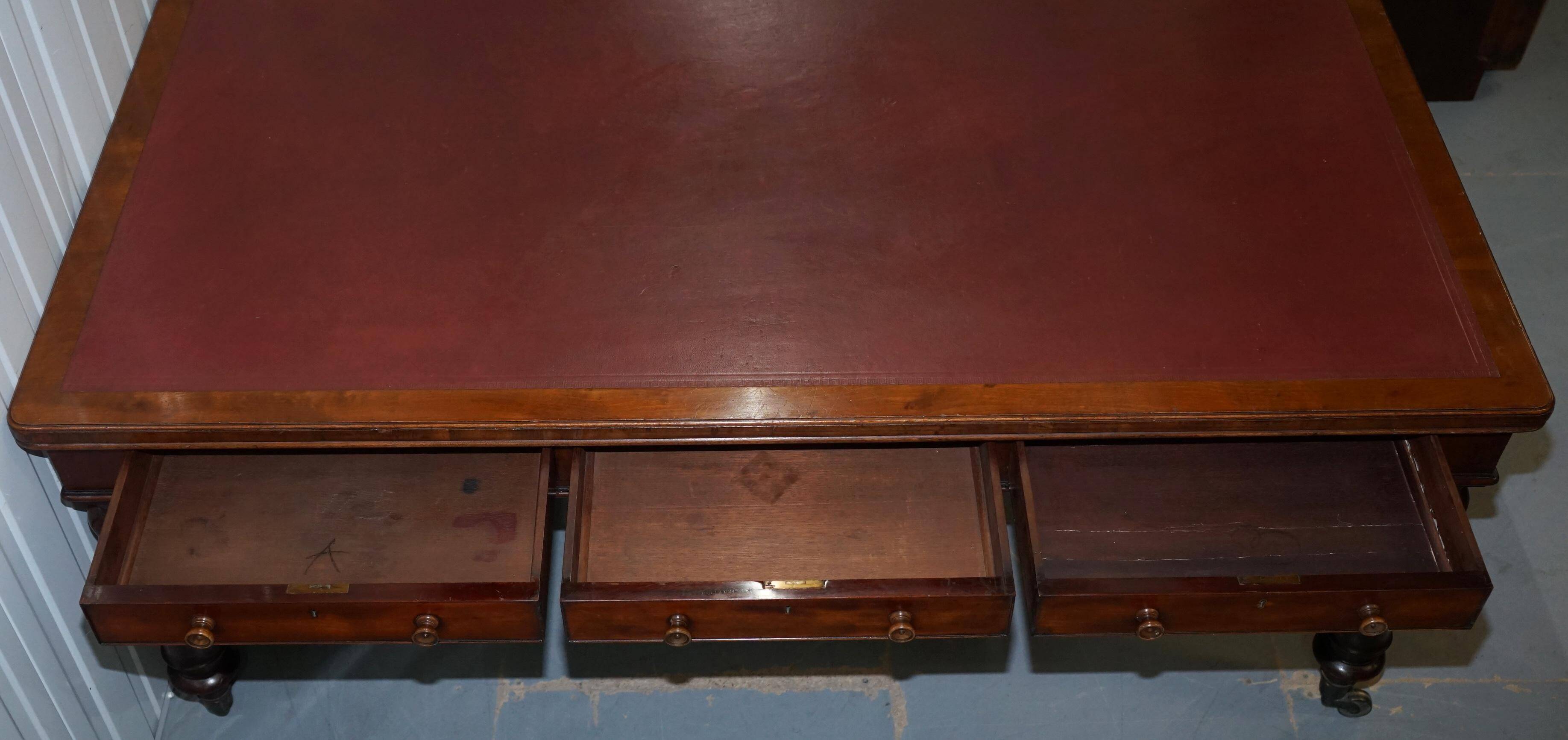 Rare double-sided desk in hardwood by Holland and Sons, Victorian era.