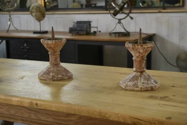 Pair of patinated cast iron candlesticks, 1940s