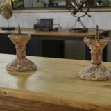 Pair of patinated cast iron candlesticks, 1940s