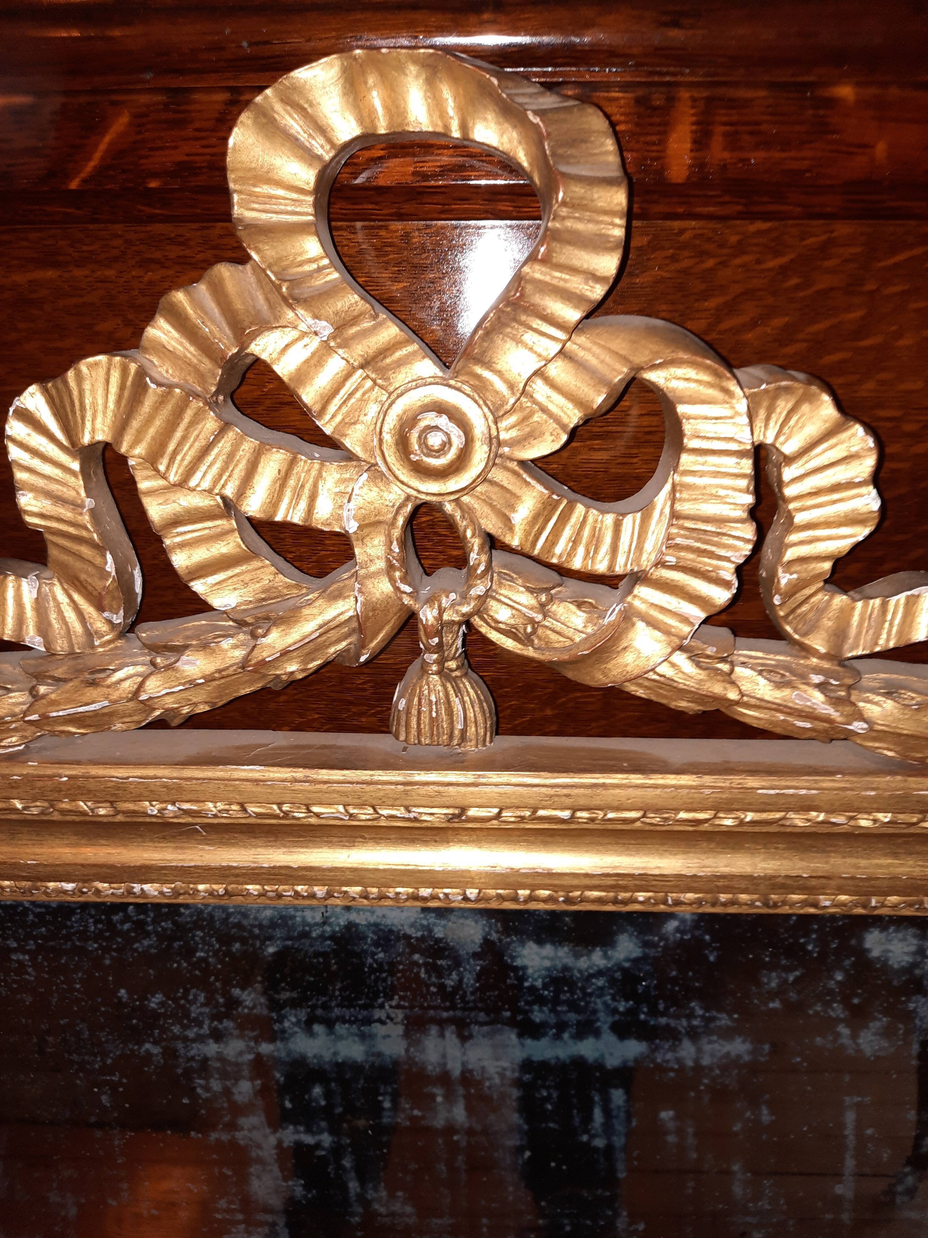 Louis XVI style gilded mirror