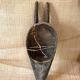 Ancient wooden and brass mask
