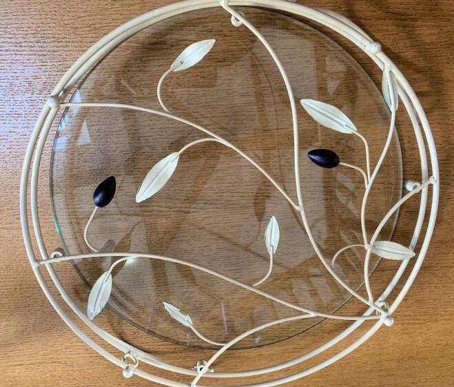 Round wrought iron and glass tray decorated with olives and foliage