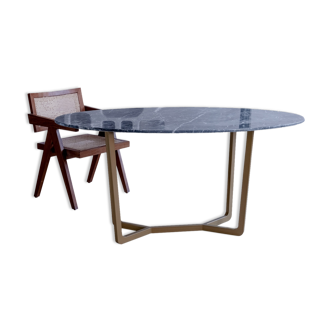 Oval dining table in grey marble Emperador