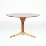 Dining table by Melchiorre Bega, brass and wood, Italy, 1950s.