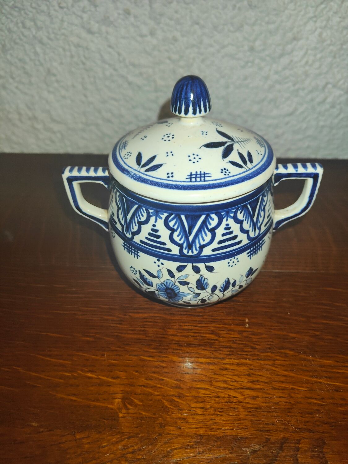 Henriot Quimper earthenware coffee set with floral decoration and elegant blue