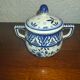 Henriot Quimper earthenware coffee set with floral decoration and elegant blue